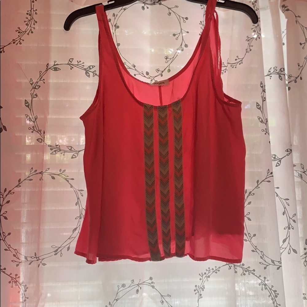 I’m selling a tank top blouse from Persaya